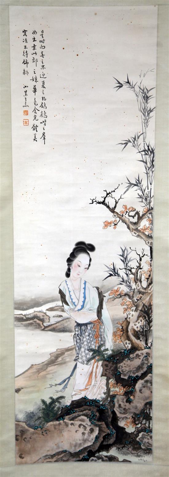 Chinese School, 20th century. A scroll painting of a lady in a rockwork landscape, image 126.5 x 39cm